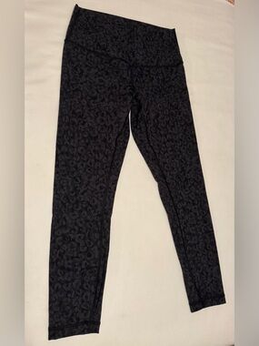 Lululemon size 8 leggings.  EUC. Subtle black print design.  Full length.
